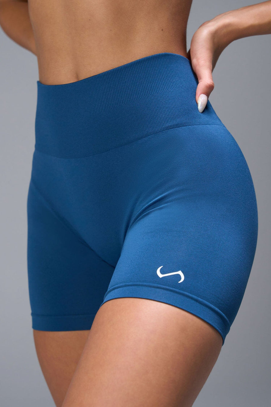 Front View of Blue TLF Cosmic Seamless Scrunch Butt Shorts, featuring a scrunch butt to shape and contour your glutes