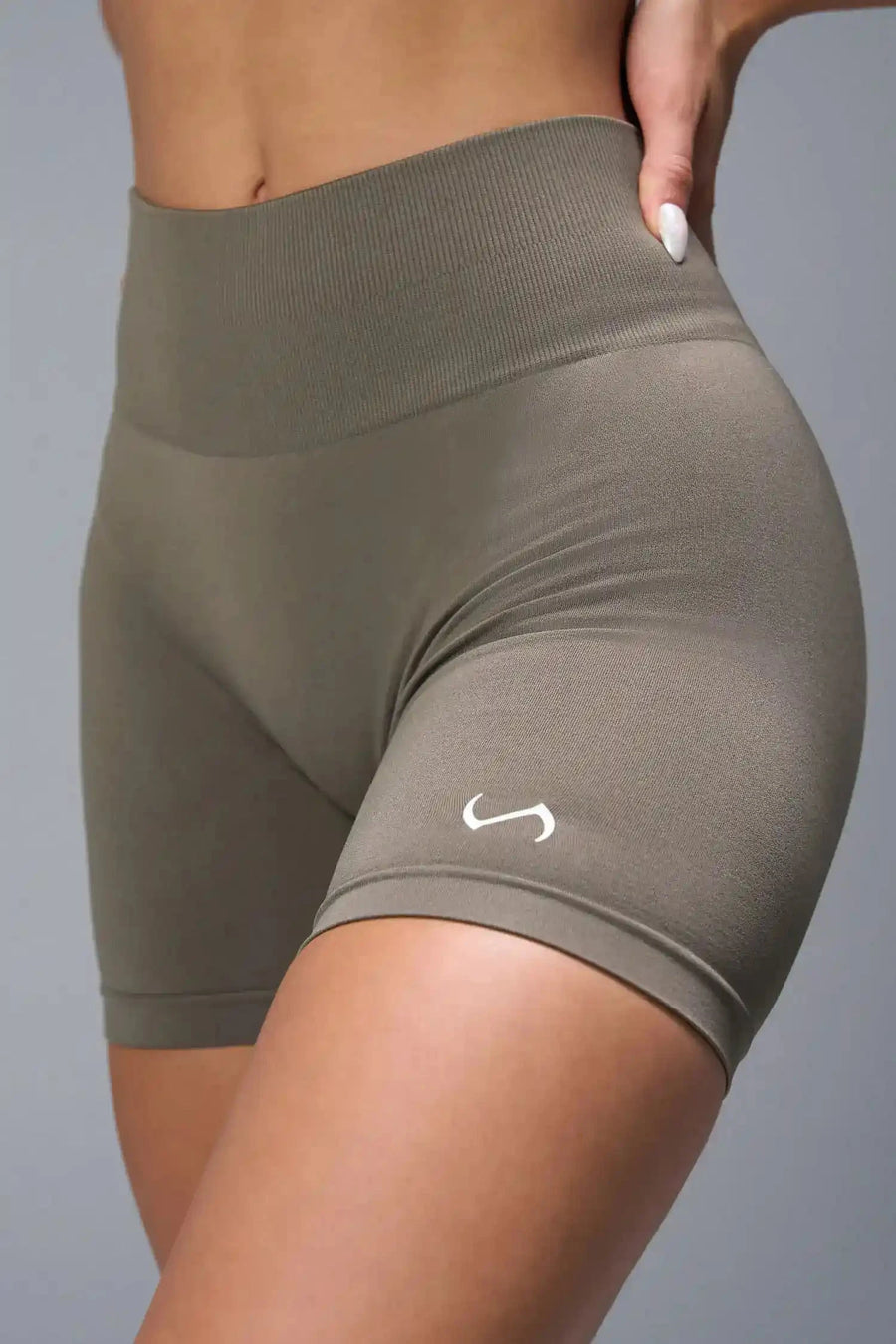 Front View of Brown TLF Cosmic Seamless Scrunch Butt Shorts, featuring a scrunch butt to shape and contour your glutes 