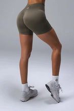 Back View of Brown TLF Cosmic Seamless Scrunch Butt Shorts, featuring a scrunch butt to shape and contour your glutes 