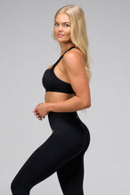 Side View Of Cosmic Seamless Square Neck Sports Bra in Black