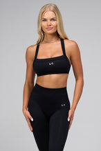 Front View Of Cosmic Seamless Square Neck Sports Bra in Black