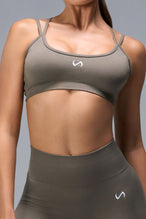Front View of Brown TLF Cosmic Seamless Strappy Sports, featuring medium impact support and a strappy back design 