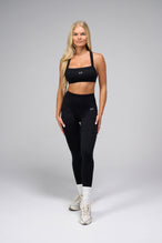 Front View Of Cosmic Seamless Square Neck Sports Bra in Black