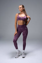 Front View of Purple TLF Cosmic Seamless Strappy Sports, featuring medium impact support and a strappy back design 