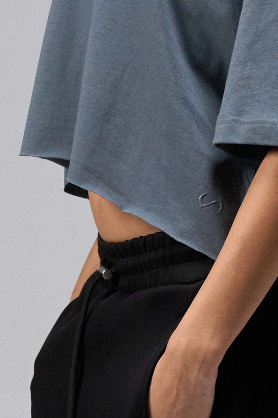 Zoomed Side view Of Women's Dura Cotton Oversized Cropped Tee in Stormy Weather