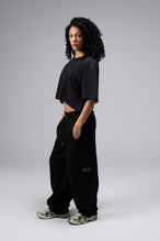 Side view Of Women's Dura Cotton Oversized Cropped Tee in Black