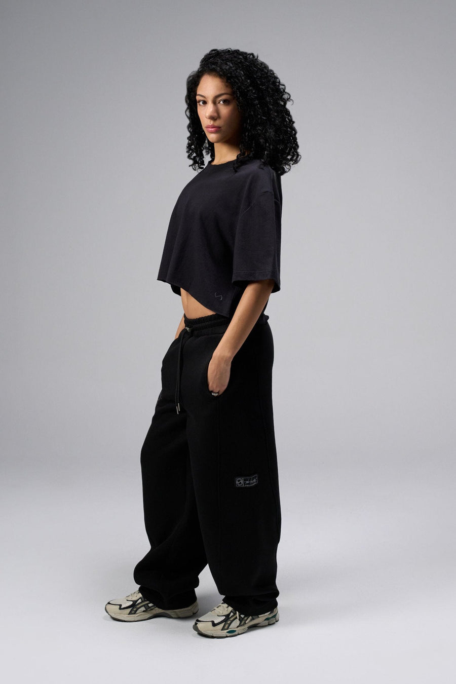 Side view Of Women's Dura Cotton Oversized Cropped Tee in Black