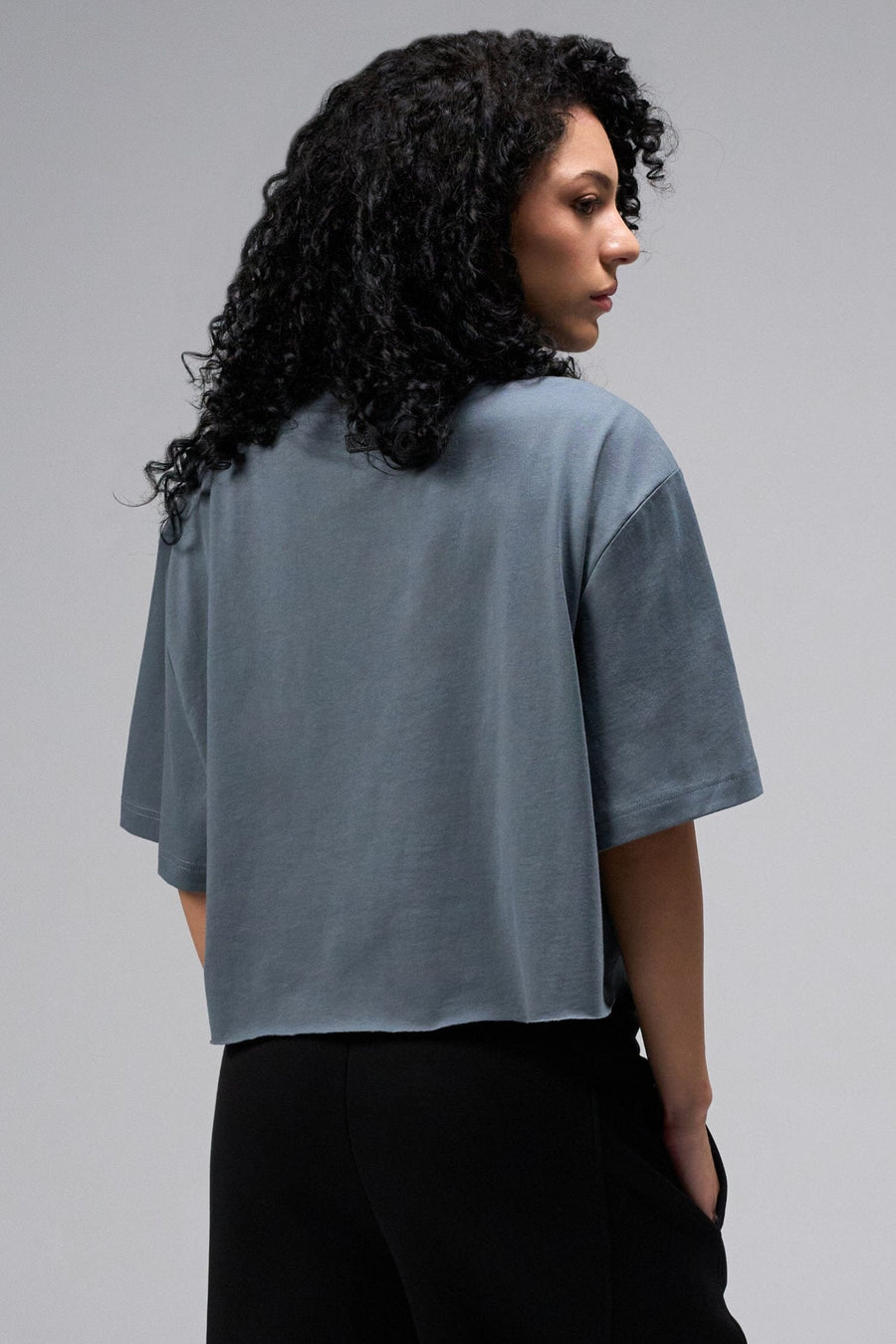 Back view Of Women's Dura Cotton Oversized Cropped Tee in Stormy Weather