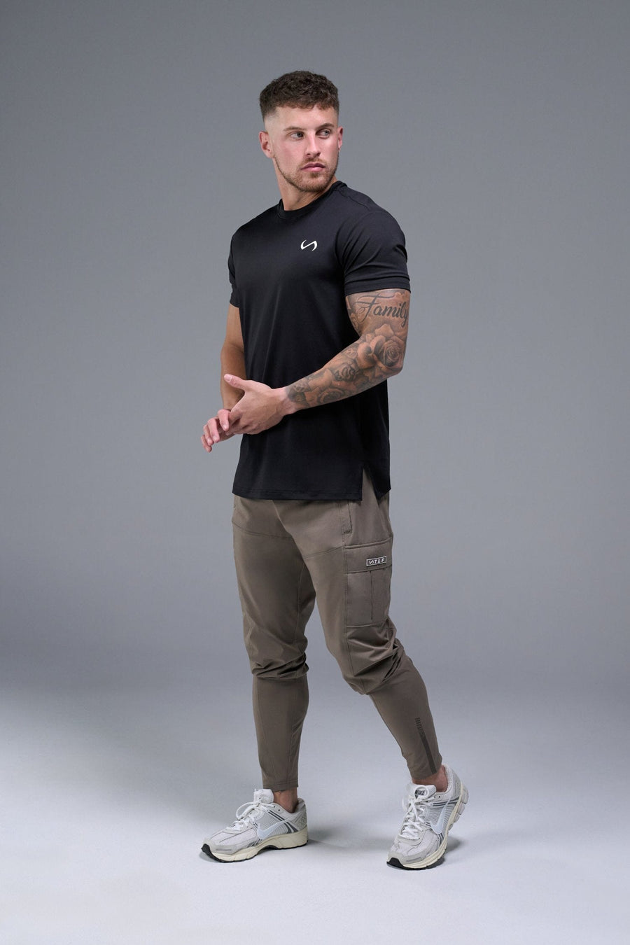 Front View of Brown TLF Element Athletic Joggers 2.0, featuring side zipper pockets and side leg cargo pockets and reflective details 