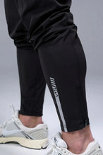 Detail Back View of Black TLF Element Athletic Joggers 2.0, featuring side zipper pockets and side leg cargo pockets and reflective details 