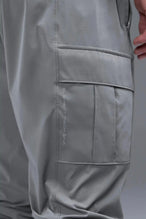 Front View of Gray TLF Element Athletic Joggers 2.0, featuring side zipper pockets and side leg cargo pockets and reflective details 