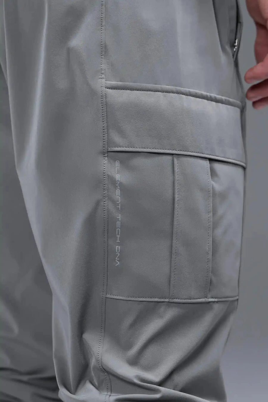 Front View of Gray TLF Element Athletic Joggers 2.0, featuring side zipper pockets and side leg cargo pockets and reflective details 