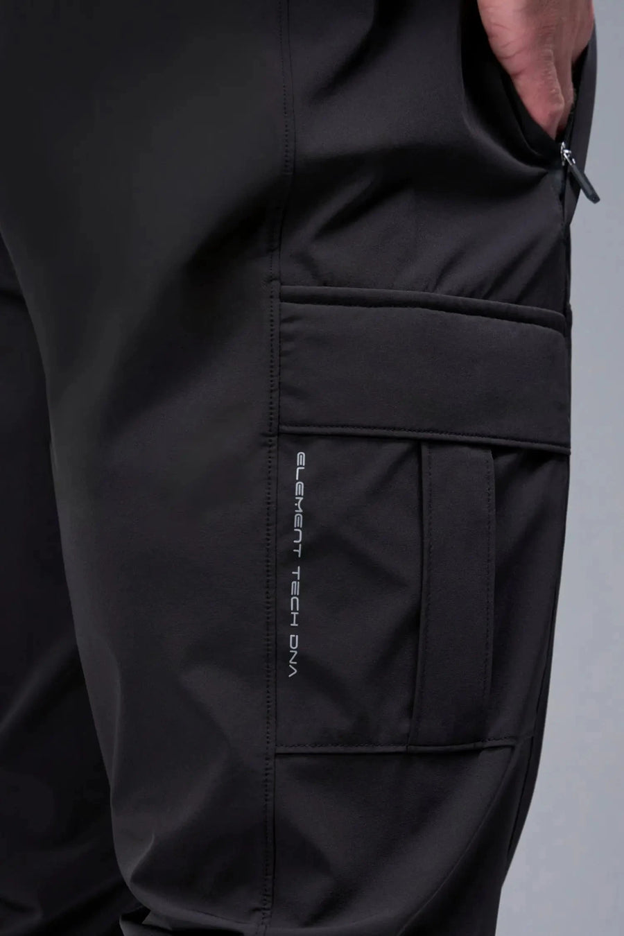 Detail Back View of Black TLF Element Athletic Joggers 2.0, featuring side zipper pockets and side leg cargo pockets and reflective details 