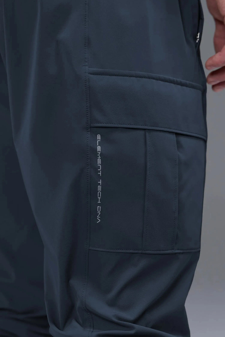 Front View of Blue TLF Element Athletic Joggers 2.0, featuring side zipper pockets and side leg cargo pockets and reflective details 