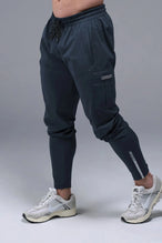Front View of Blue TLF Element Athletic Joggers 2.0, featuring side zipper pockets and side leg cargo pockets and reflective details 