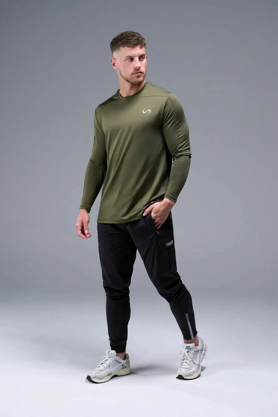Front View of Black TLF Element Athletic Joggers 2.0, featuring side zipper pockets and side leg cargo pockets and reflective details 