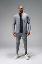 Front View of Gray the TLF Element Infi-Dry Hybrid Joggers featuring side zipper pockets, zippered ankles and drawcord waistband for a custom fit. 