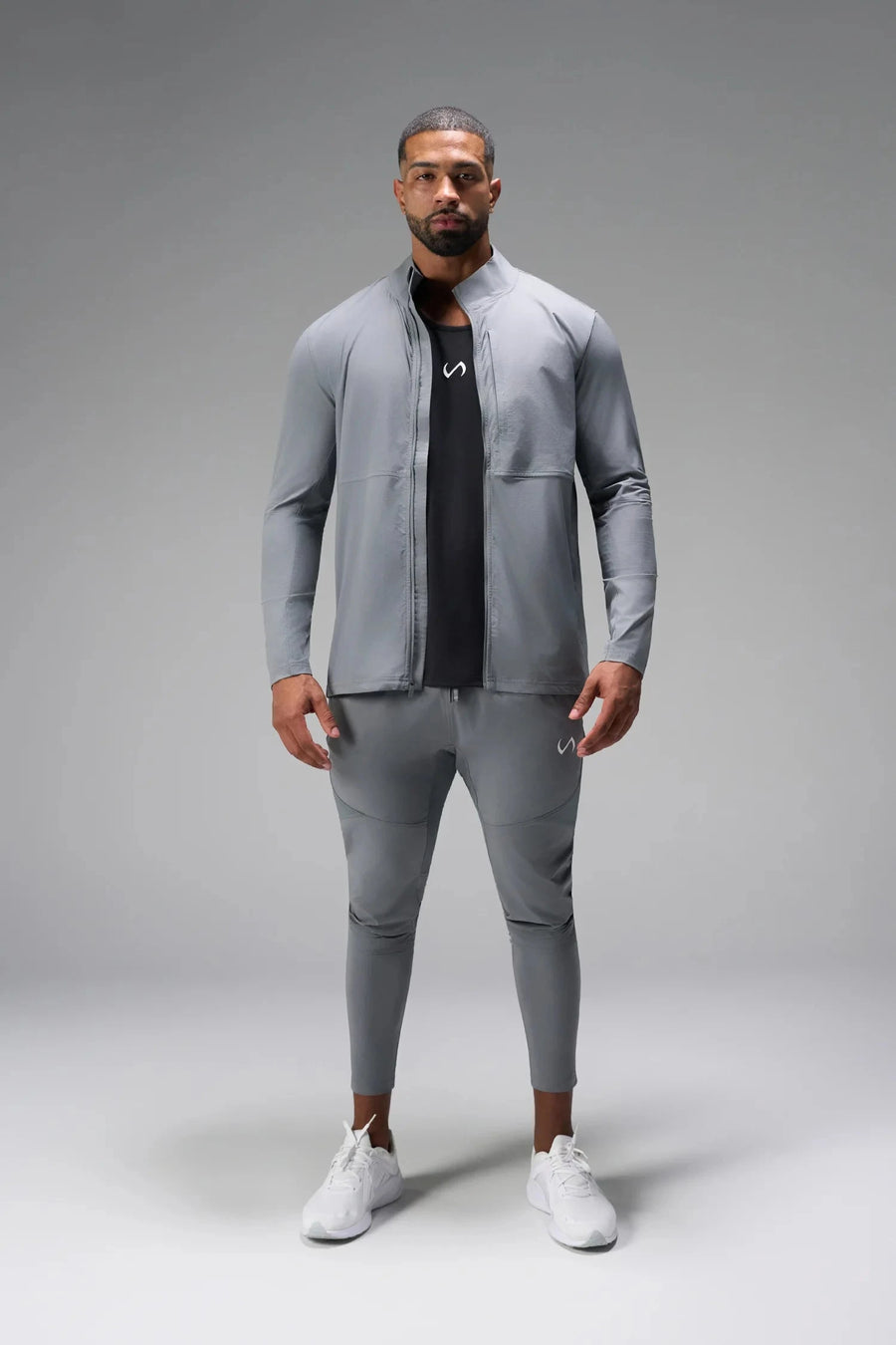 Front View of Gray the TLF Element Infi-Dry Hybrid Joggers featuring side zipper pockets, zippered ankles and drawcord waistband for a custom fit. 