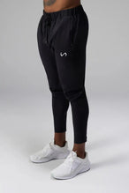 Front View of Black the TLF Element Infi-Dry Hybrid Joggers featuring side zipper pockets, zippered ankles and drawcord waistband for a custom fit. 