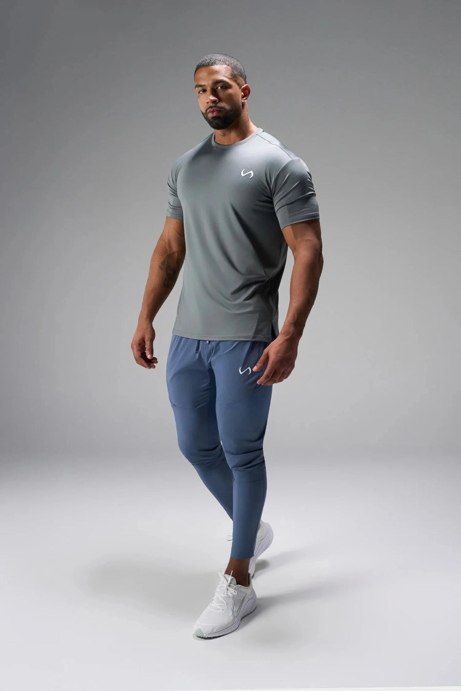 Front View of Blue the TLF Element Infi-Dry Hybrid Joggers featuring side zipper pockets, zippered ankles and drawcord waistband for a custom fit.