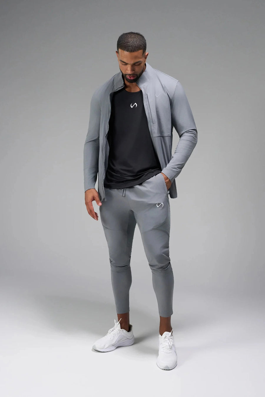 Front View of Gray the TLF Element Infi-Dry Hybrid Joggers featuring side zipper pockets, zippered ankles and drawcord waistband for a custom fit. 
