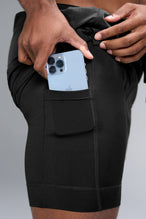 Detail Side View of Black TLF Element Shorts With Liner, 2 in 1 shorts featuring side zipper pockets, 5 inch inseam and 7 Inch inseam Liner Short 