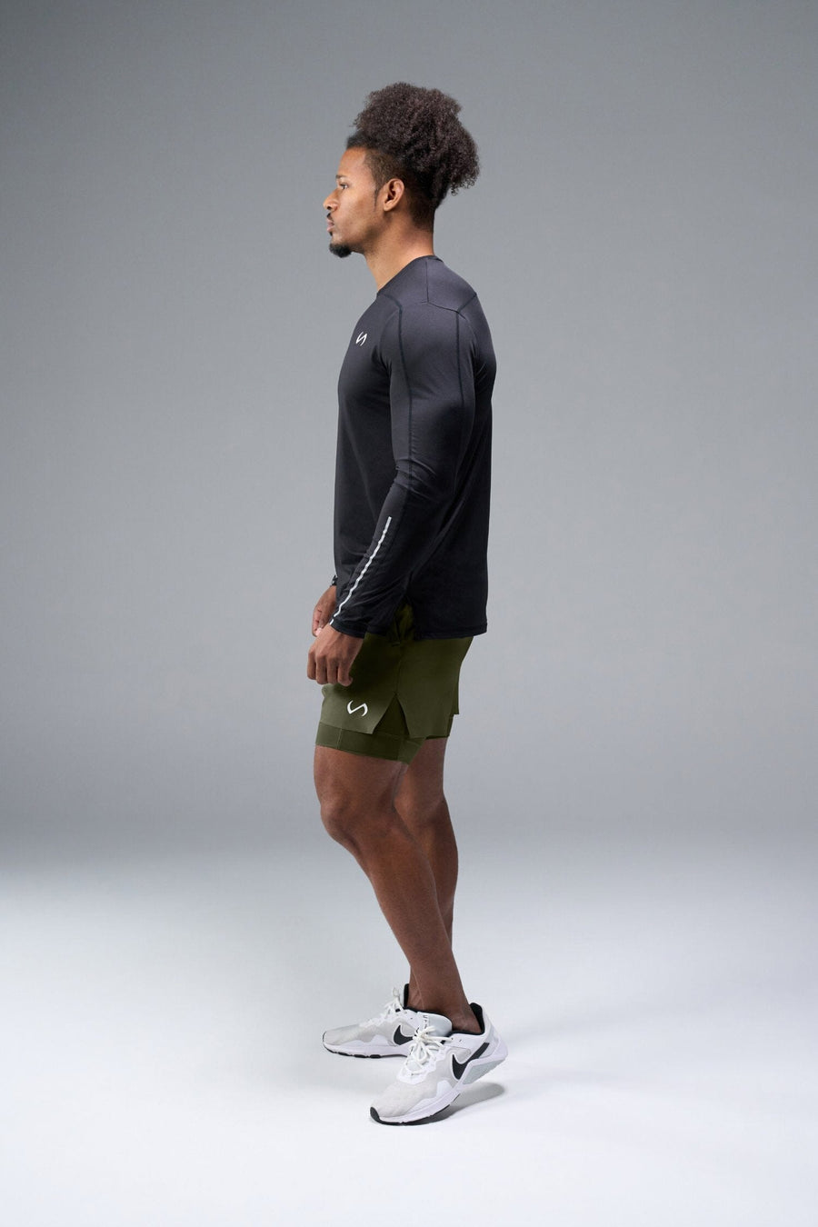 Side View of Green TLF Element Shorts With Liner, 2 in 1 shorts featuring side zipper pockets, 5 inch inseam and 7 Inch inseam Liner Short 