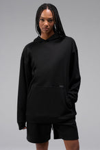 Front View of Black TLF Elevate Waffle Tech Hoodie, featuring kangaroo pockets, and double panel hoodie designed for all day wear