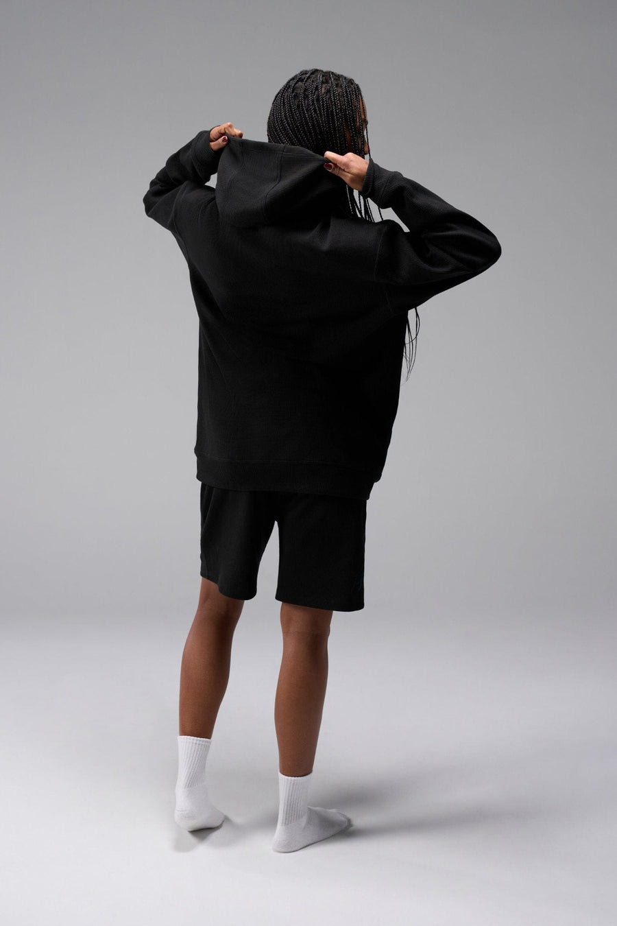 Back View of Black TLF Elevate Waffle Tech Hoodie, featuring kangaroo pockets, and double panel hoodie designed for all day wear