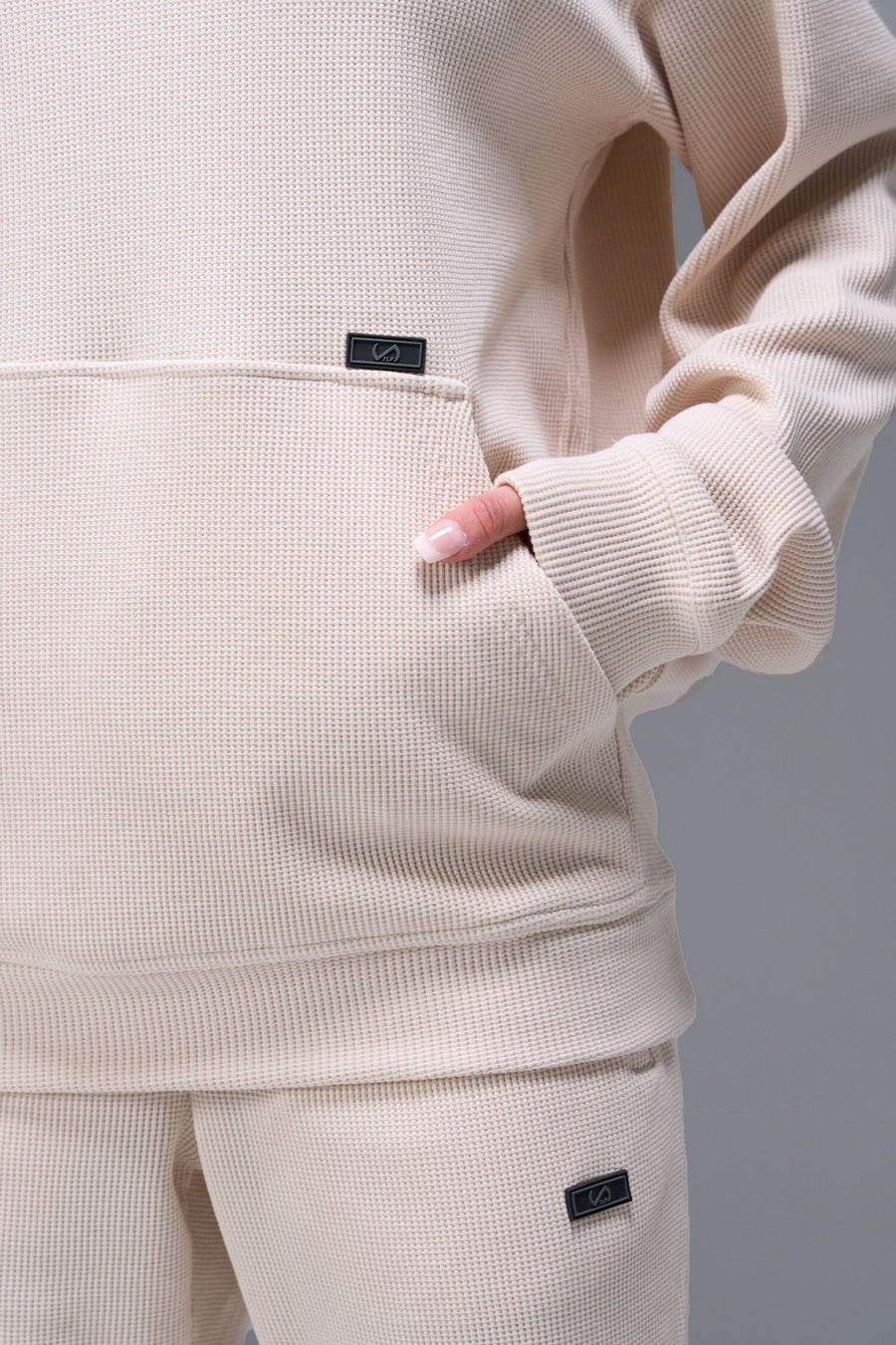 Detail Front View of White TLF Elevate Waffle Tech Hoodie, featuring kangaroo pockets, and double panel hoodie designed for all day wear