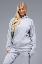 Front View of Gray TLF Elevate Waffle Tech Hoodie, featuring kangaroo pockets, and double panel hoodie designed for all day wear 