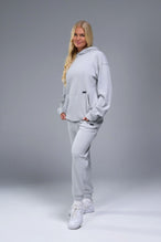 Front View of Gray TLF Elevate Waffle Tech Joggers, featuring an athletic relaxed fit with zipper pockets designed for all day wear
