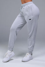 Front View of Gray TLF Elevate Waffle Tech Joggers, featuring an athletic relaxed fit with zipper pockets designed for all day wear