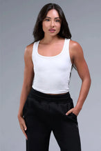 Front View of White TLF Essential Ribbed Tank Top, featuring a scoop neckline in our ribbed tech fabric 