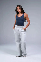 Front View of Blue TLF Essential Ribbed Tank Top, featuring a scoop neckline in our ribbed tech fabric