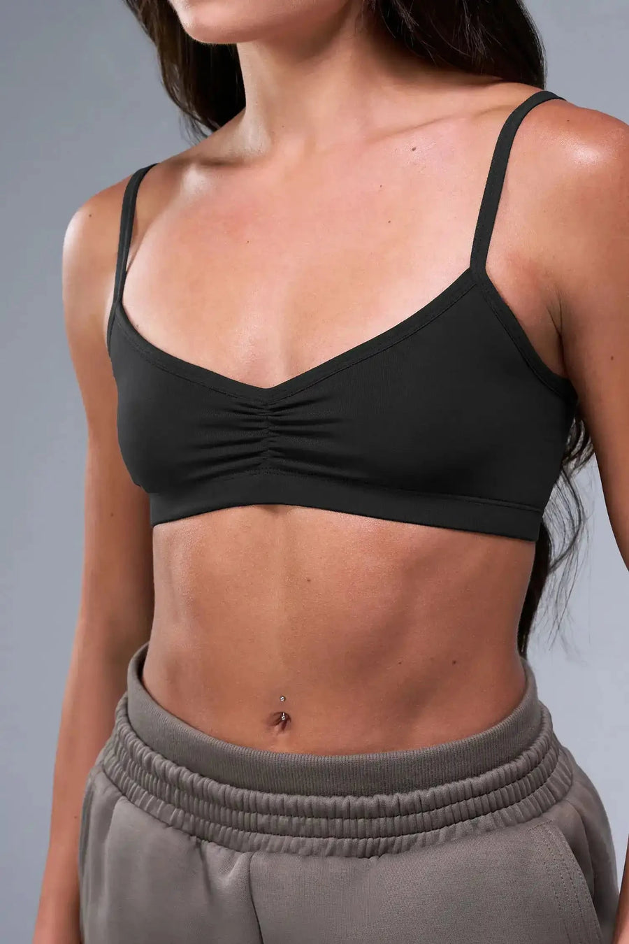 Back View of Black TLF Essential Scrunch Seamless Bralette, featuring adjustable straps for a custom fit and scrunch front design 