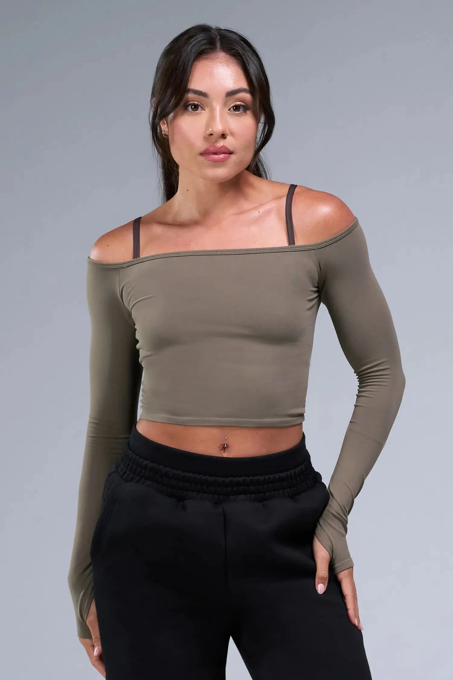 Front View of Brown TLF Essential Scrunch Seamless Bralette wearing under the Essential Seamless Off The Shoulder Top, featuring adjustable straps for a custom fit and scrunch front design 