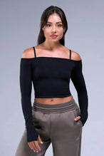 Front View of Black TLF Essential Scrunch Seamless Bralette wearing under the Essential Seamless Off The Shoulder Top, featuring adjustable straps for a custom fit and scrunch front design 