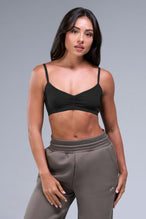 Front View of Black TLF Essential Scrunch Seamless Bralette, featuring adjustable straps for a custom fit and scrunch front design 