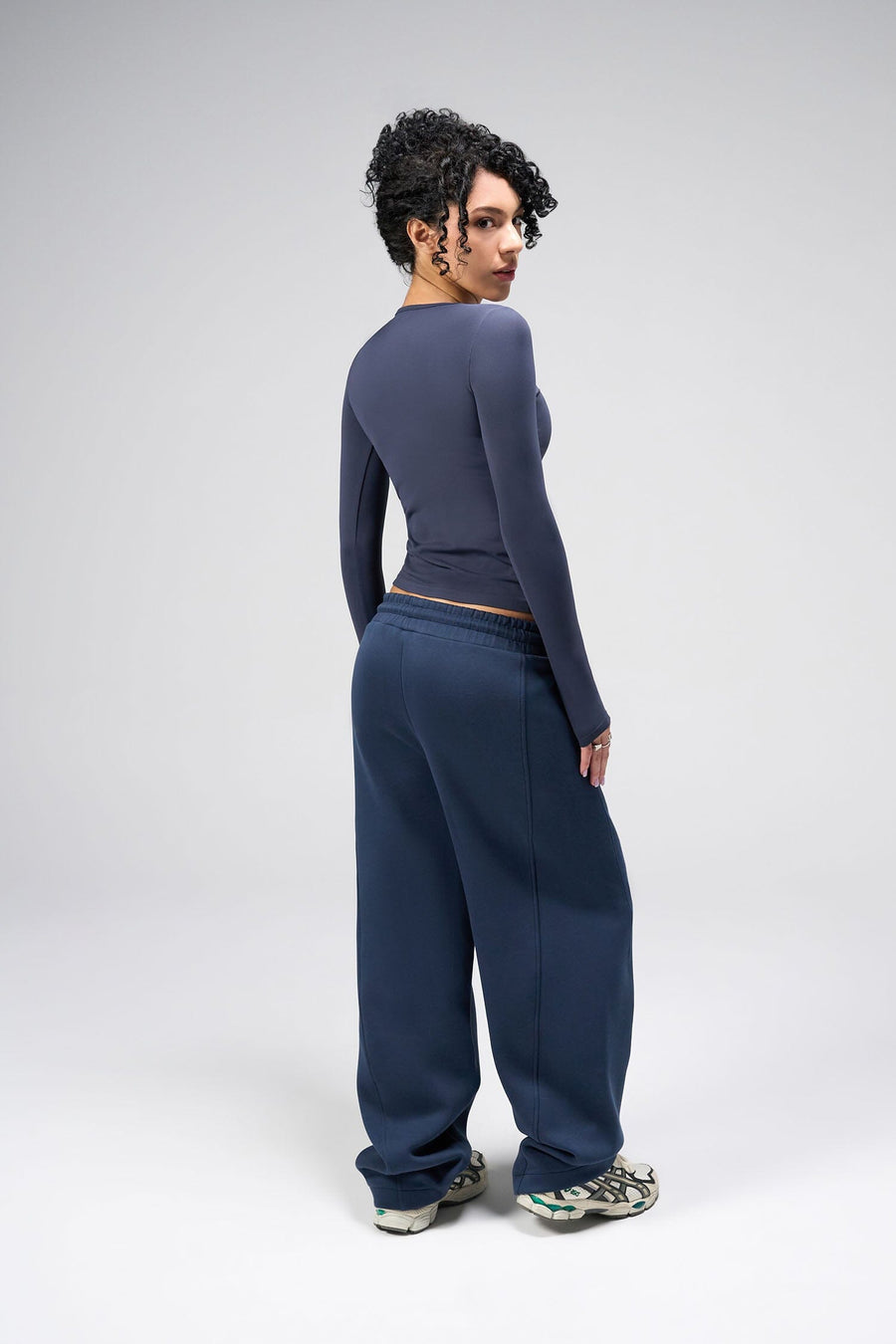 Back View Of Women's Essential Seamless Long Sleeve Top in Blue Nights