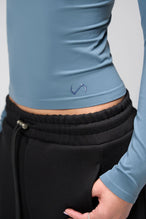 Side View Of Women's Essential Seamless Long Sleeve Top in Stormy Weather 