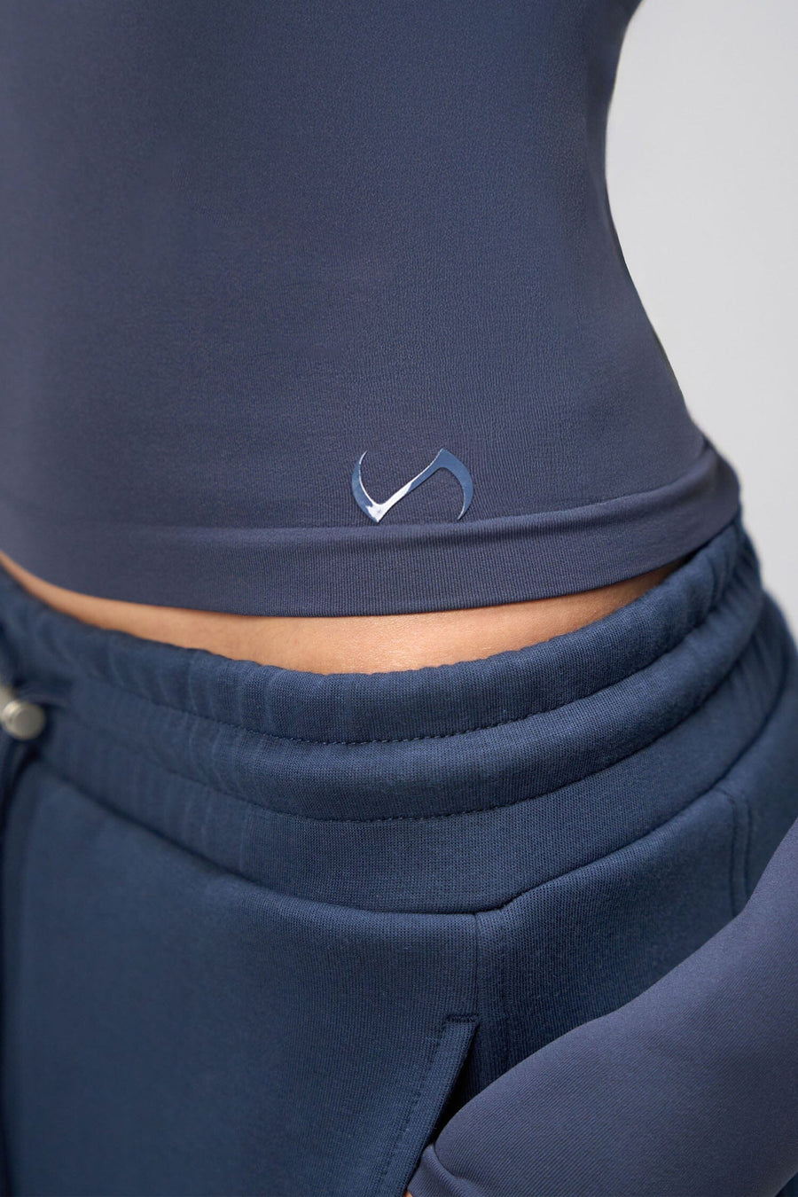 Side View Of Women's Essential Seamless Long Sleeve Top in Blue Nights