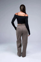 Back View of Black TLF Essential Seamless off the shoulder top, featuring a cropped length and thumbholes 