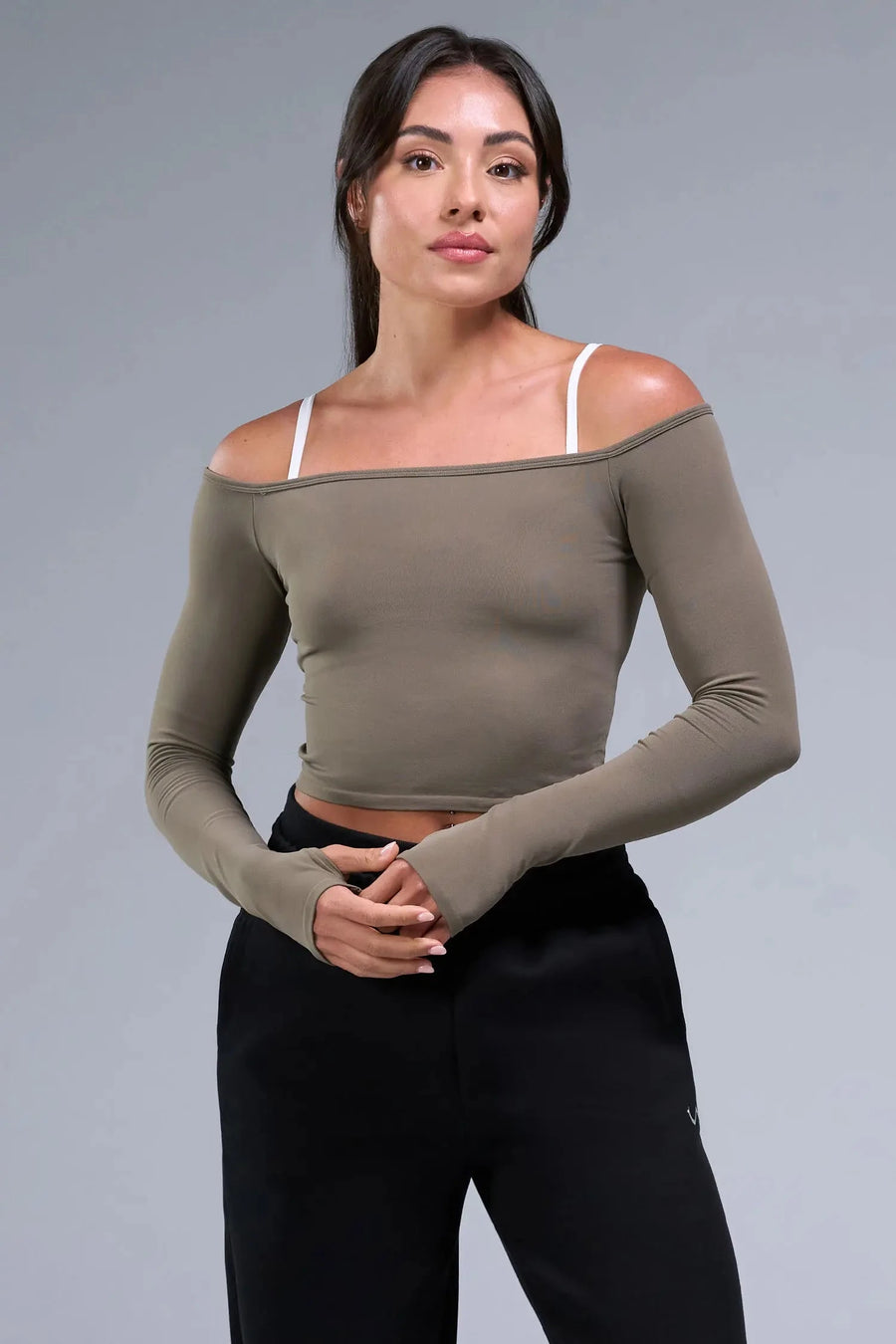 Front View of Brown TLF Essential Seamless off the shoulder top, featuring a cropped length and thumbholes 
