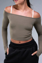 Front View of Brown TLF Essential Seamless off the shoulder top, featuring a cropped length and thumbholes 