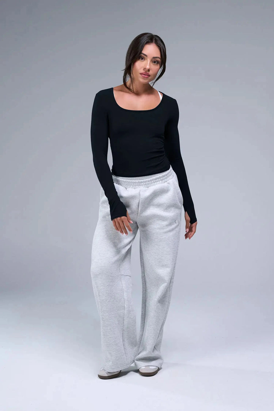 Front View of Black TLF Essential Seamless Reversible Scoop Neck, featuring thumbholes and multi wear for boat neck or scoop neck styling 