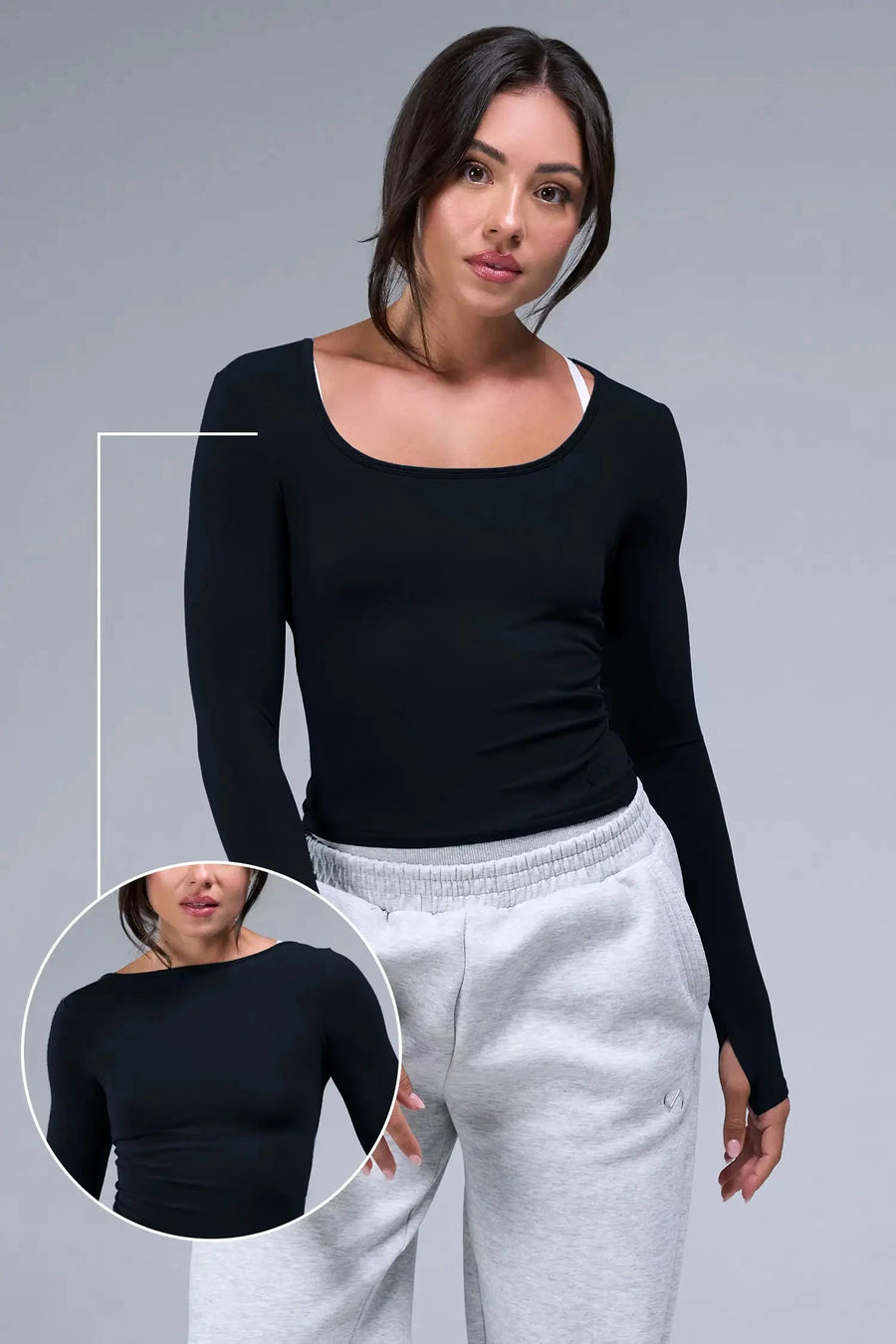 Front View of Black TLF Essential Seamless Reversible Scoop Neck, featuring thumbholes and multi wear for boat neck or scoop neck styling 