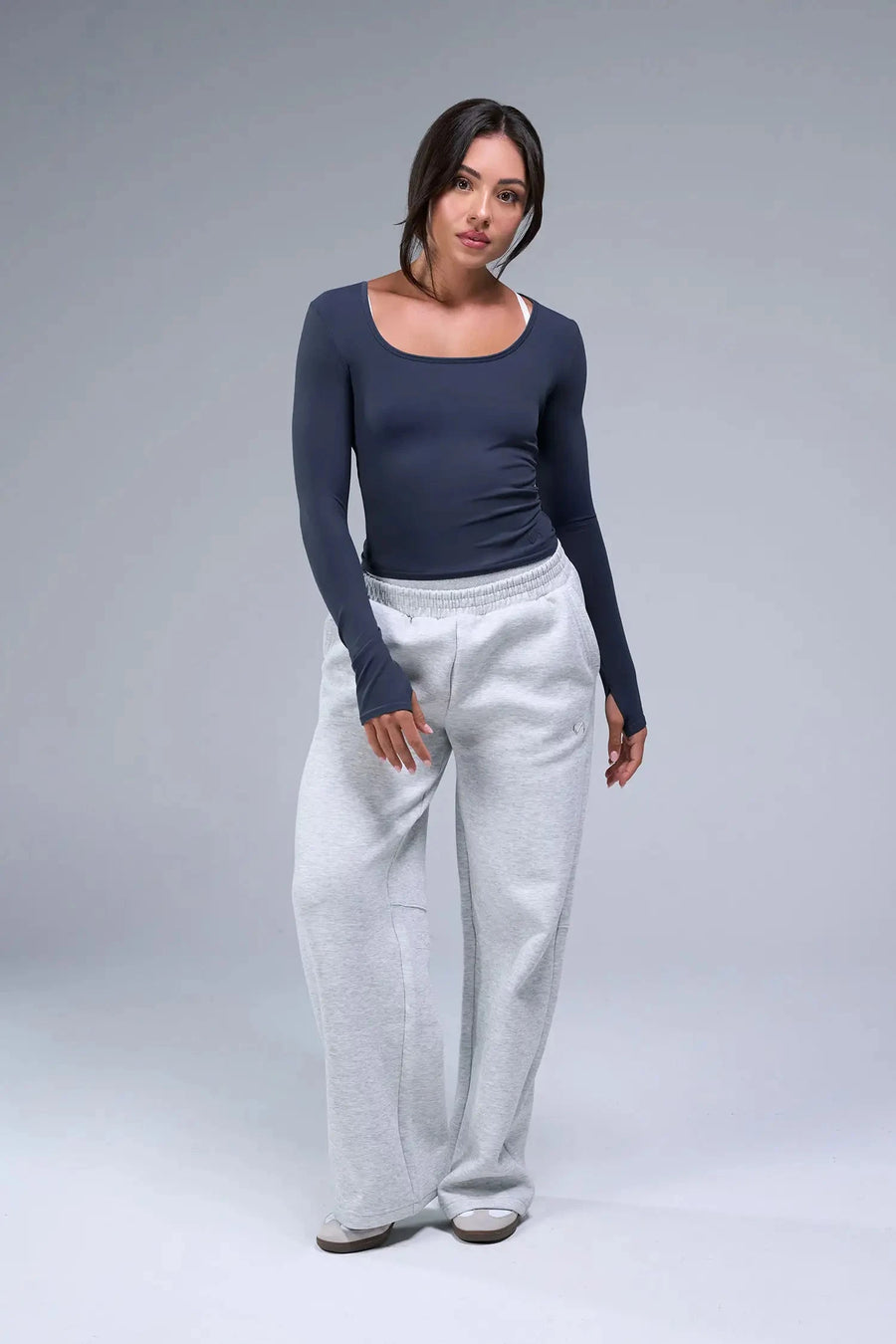 Front View of Blue TLF Essential Seamless Reversible Scoop Neck, featuring thumbholes and multi wear for boat neck or scoop neck styling 