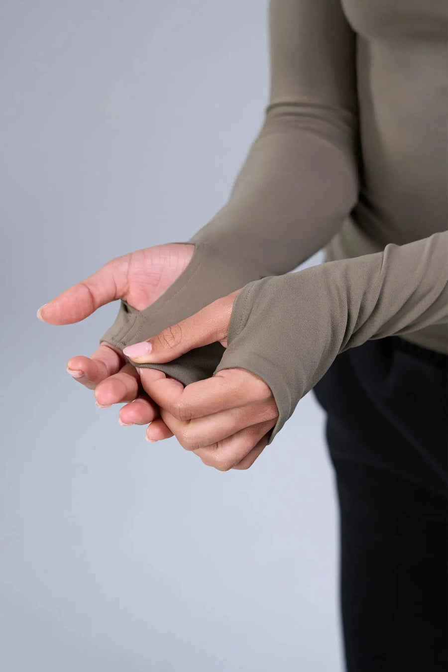 Detail Sleeves View of Brown TLF Essential Seamless Reversible Scoop Neck, featuring thumbholes and multi wear for boat neck or scoop neck styling 