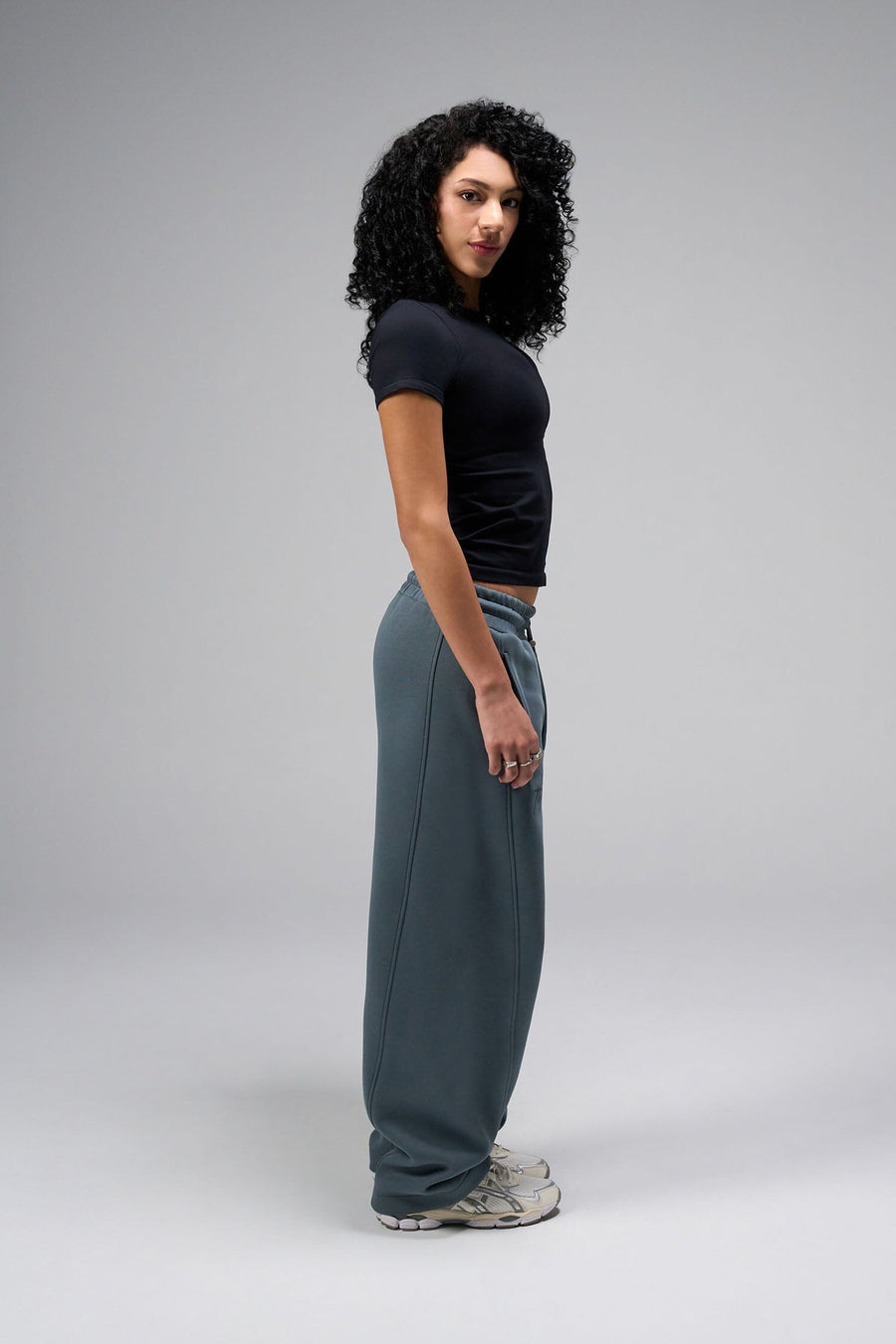 Side View Of Women's Essential Seamless T Shirt in Black